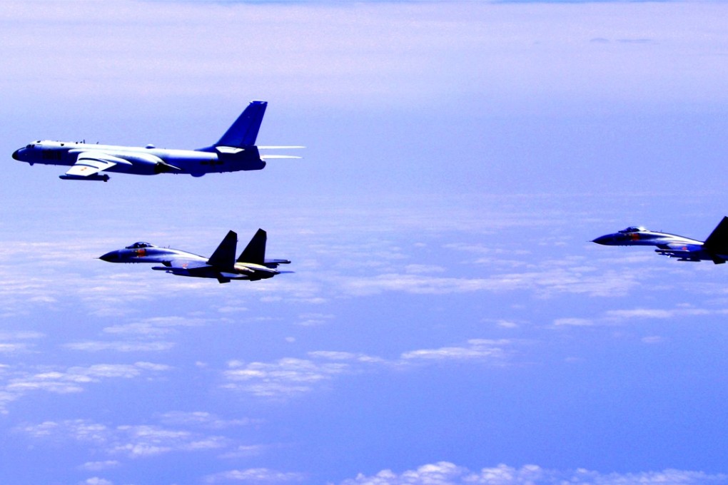 An H-6K bomber takes part in this Chinese air force formation on April 19. Similar formations conducted island patrols recently during a training exercise with an aim of improving the ability to safeguard national sovereignty, an air force representative confirmed Thursday. Photo: Xinhua