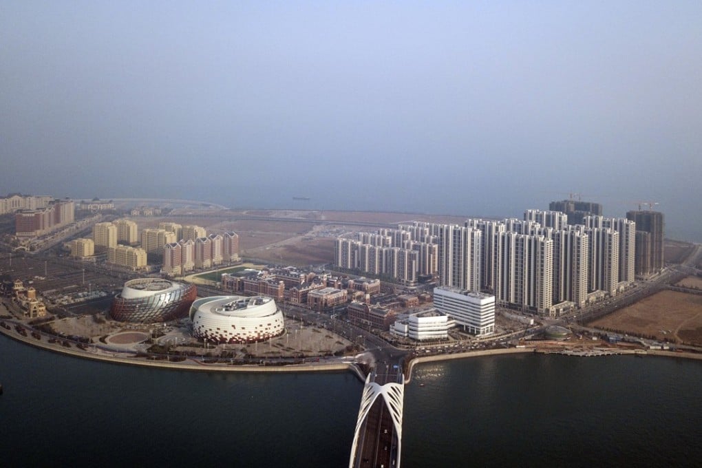 Buildings stand at the Oriental Movie Metropolis film production hub in this aerial photograph taken in Qingdao on Tuesday, April 17, 2018. Photo: Bloomberg