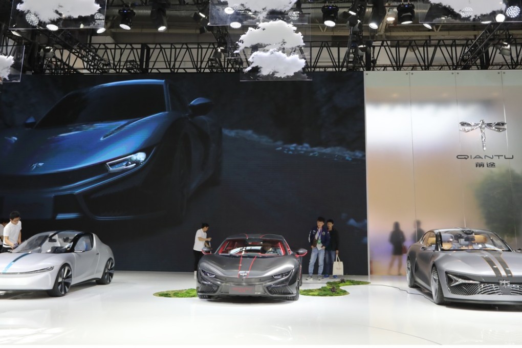 Electric cars by Chinese maker Qiantu at the Beijing auto show. China has stated its goal to dominate the electric vehicle and smart car industries over the coming seven years. Photo: Simon Song
