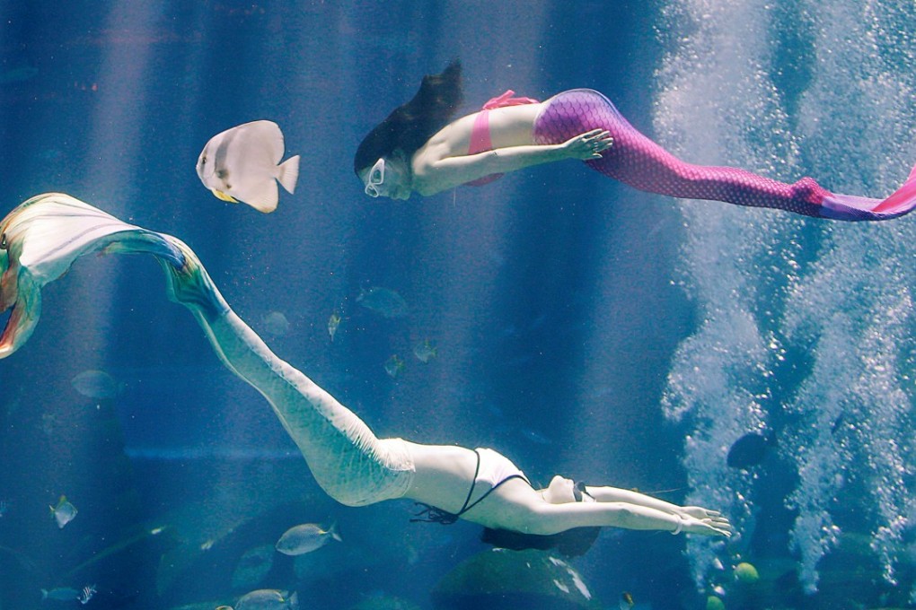Performers dressed as mermaids in the 10-metre-deep Ambassador Lagoon inside Atlantis Sanya hotel in Sanya on April 28, 2018. Photo: Reuters