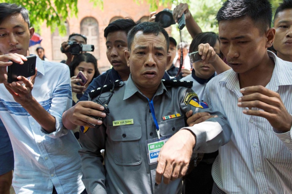 File photo of Myanmar deputy police major Moe Yan Naing leaving court on April 20, 2018. Photo: AFP