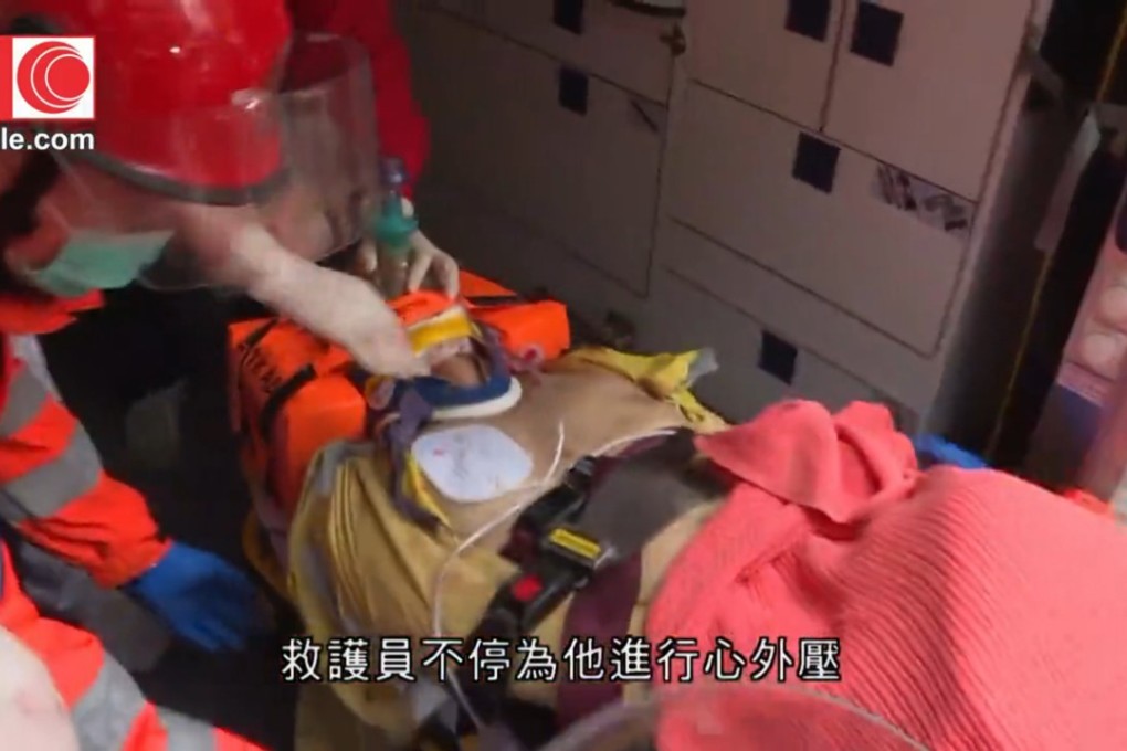 A 55-year-old man who fell down a refuse chute on Sunday is transported to hospital. Photo: Cable TV News