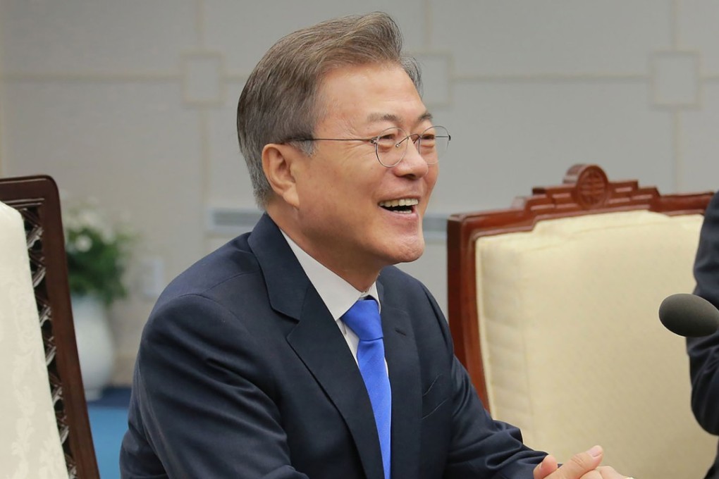 South Korean President Moon Jae-in speaking with North Korean leader Kim Jong-un (unseen) during the inter-Korean summit in the Peace House building on the southern side of the truce village of Panmunjom. This photo was taken on April 27 and released on April 29 by North Korea's Korean Central News Agency (KCNA). Photo: AFP / KCNA via KNS
