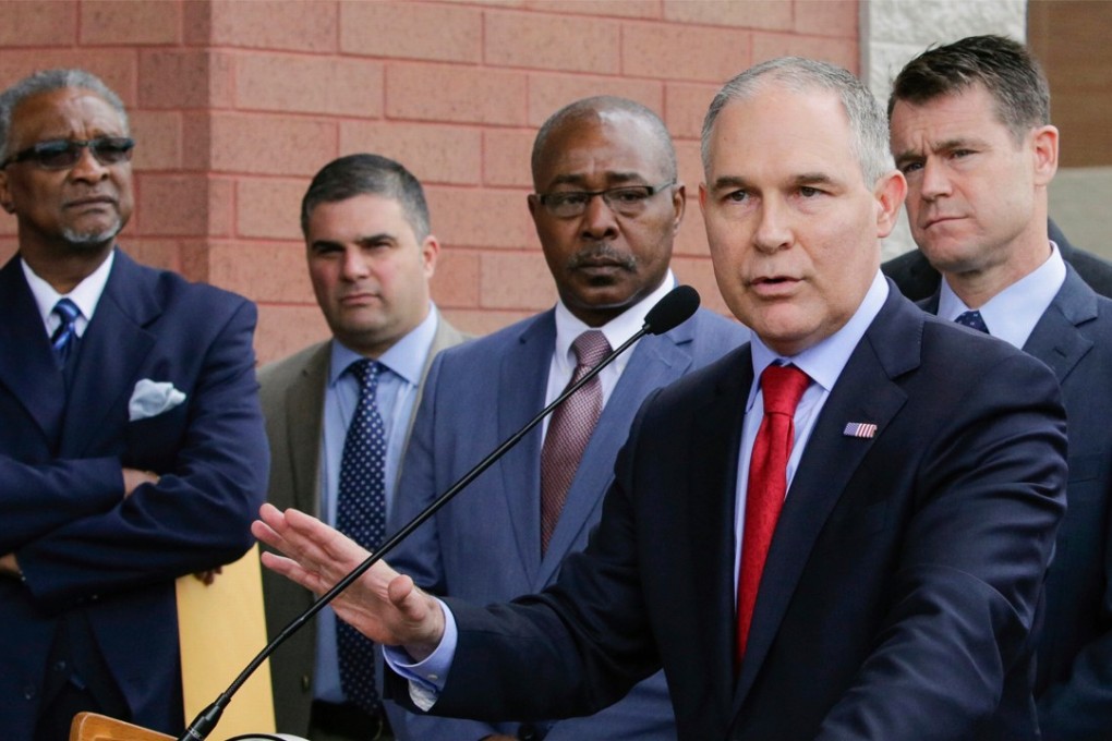 Environmental Protection Agency Administrator Scott Pruitt speaks at a news conference in April last year, with Pasquale ‘Nino’ Perrotta seen second from left. Perrotta, Pruitt’s security chief, has resigned amid anger over alleged overspending on Pruitt’s security detail. Photo: AP