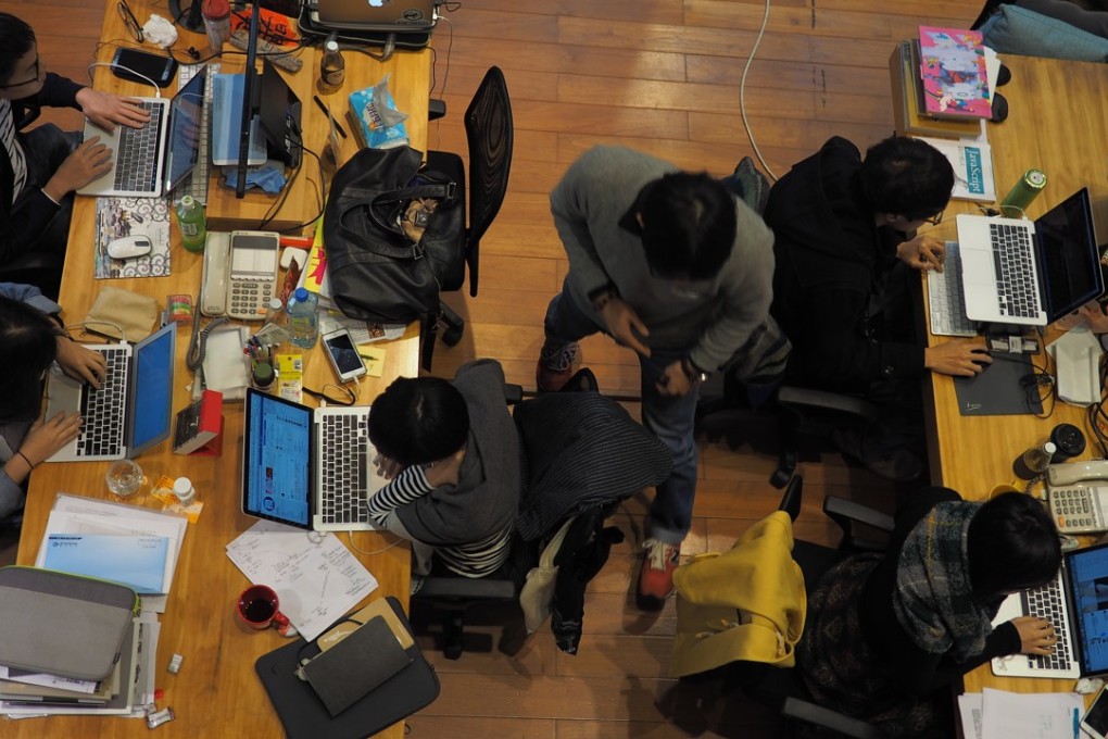 Journalists at the Taiwanese donor-funded start-up, The Reporter. Photo: Cherian George