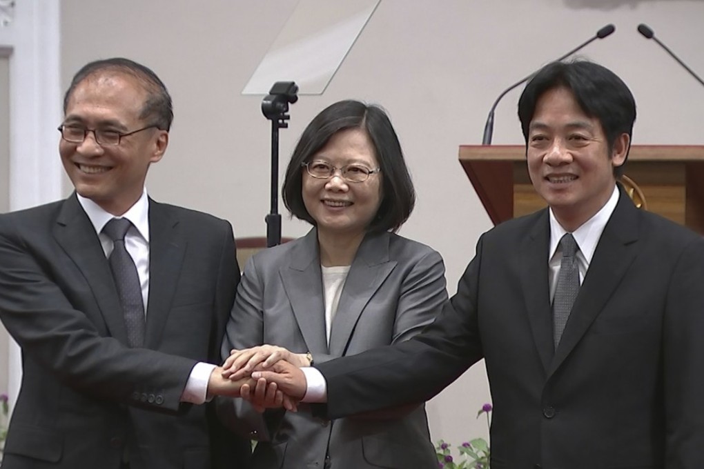 Taiwan's President Tsai Ing-wen (centre) holds hands of the outgoing premier Lin Chuan (left) and incoming premier William Lai Ching-te in Taipei in September. Photo: AP