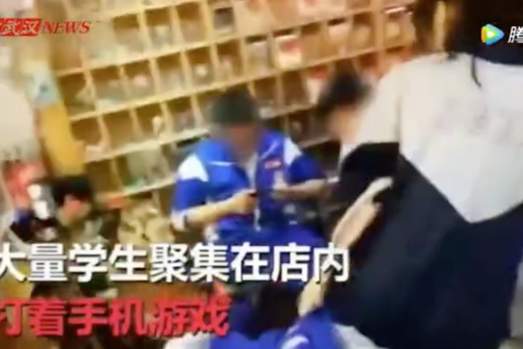 A still from video footage showing children in one of the smartphone cafes. Photo: Tencent