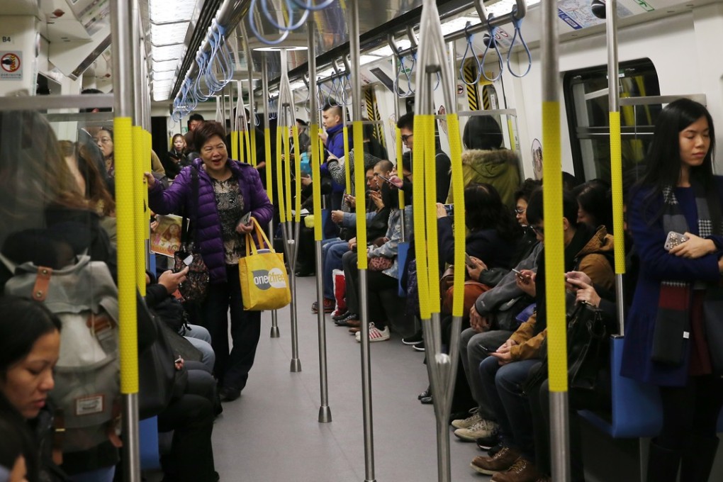 The reluctance of some passengers to give up their seats to the elderly on the MTR has been criticised. Photo: Sam Tsang
