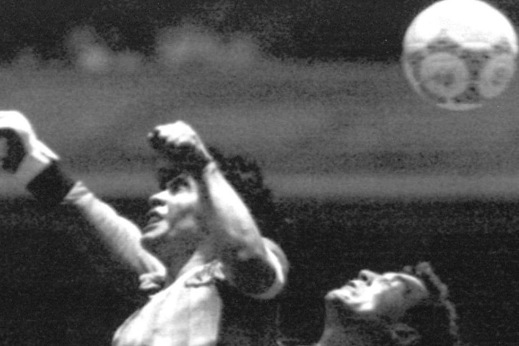 Diego Maradona beats England’s Peter Shilton to the ball to score the infamous ‘Hand of God’ goal during the 1986 World Cup. Photo: AP