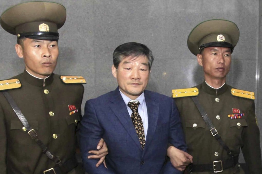 Kim Dong-chul, center, a US citizen detained in North Korea, is escorted to his trial in Pyongyang, North Korea, in April 2016. Photo: AP