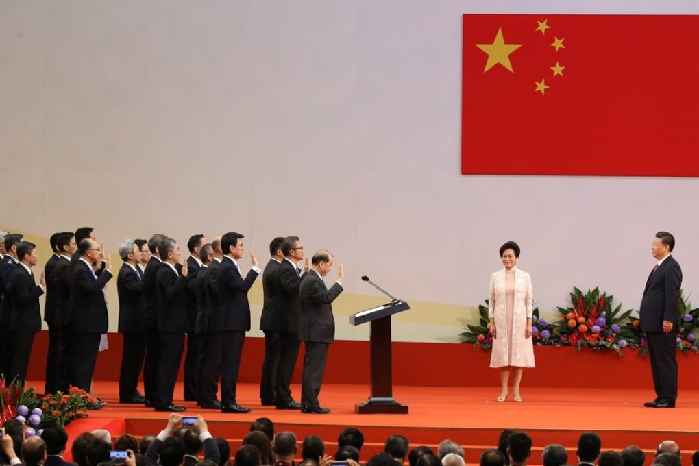 Chinese President Xi Jinping (right) officiates at the swearing-in of the Hong Kong government at the Convention and Exhibition Centre, Wan Chai, on July 1, 2017. The Hong Kong government’s protocol division has decreed that the day is no longer to be referred to as “the handover” but “return to China/the motherland” or “resume the exercise of sovereignty over Hong Kong”. Photo: Sam Tsang