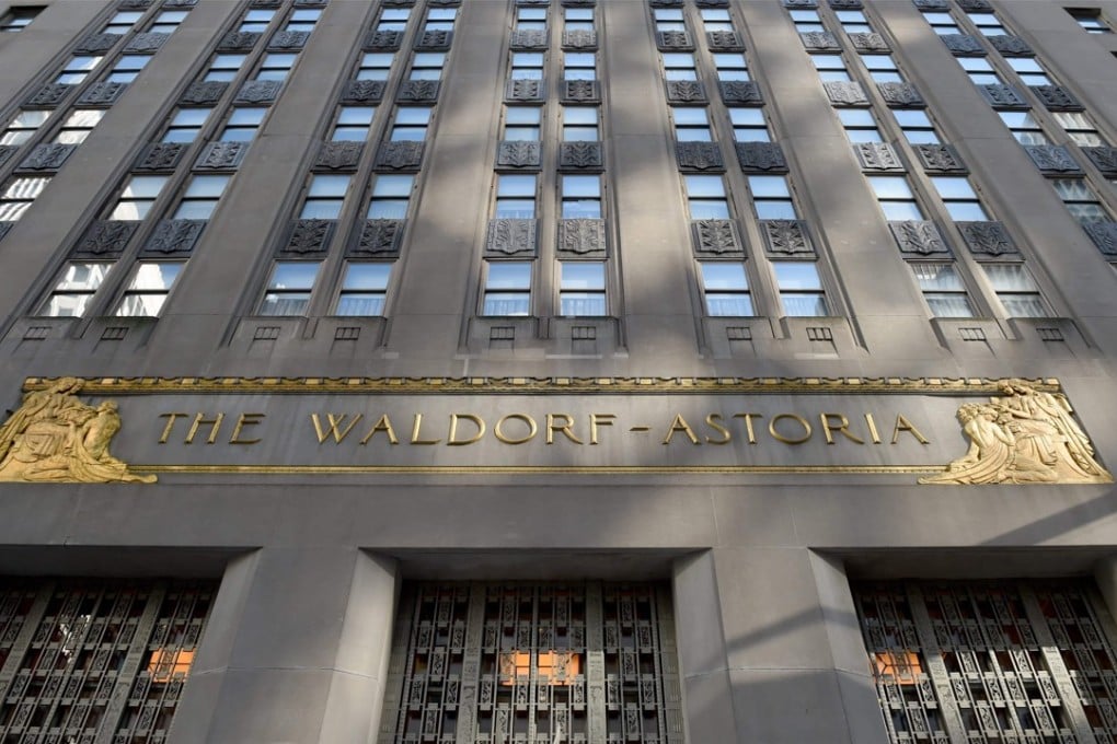 The front entrance to the Waldorf Astoria in Manhattan, one of the most famous hotels in the world. The Waldorf, now closed for renovations and partial conversion to condominiums, is up for sale now that the Chinese government has assumed control of its owner, the Anbang Insurance Group. Photo: AFP