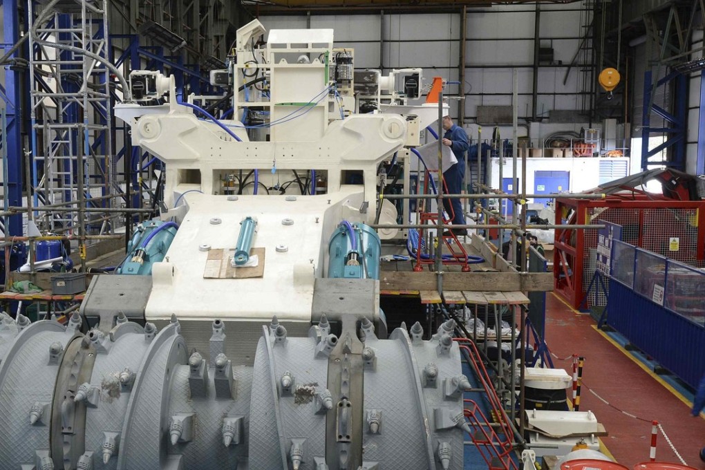 Employees at Soil Machine Dynamics work on a subsea mining machine being built for Nautilus Minerals in northern England, in April 2014. Despite prior setbacks, Nautilus Minerals’ quest to tap into undersea mineral riches has a new backer in China. Photo: Reuters