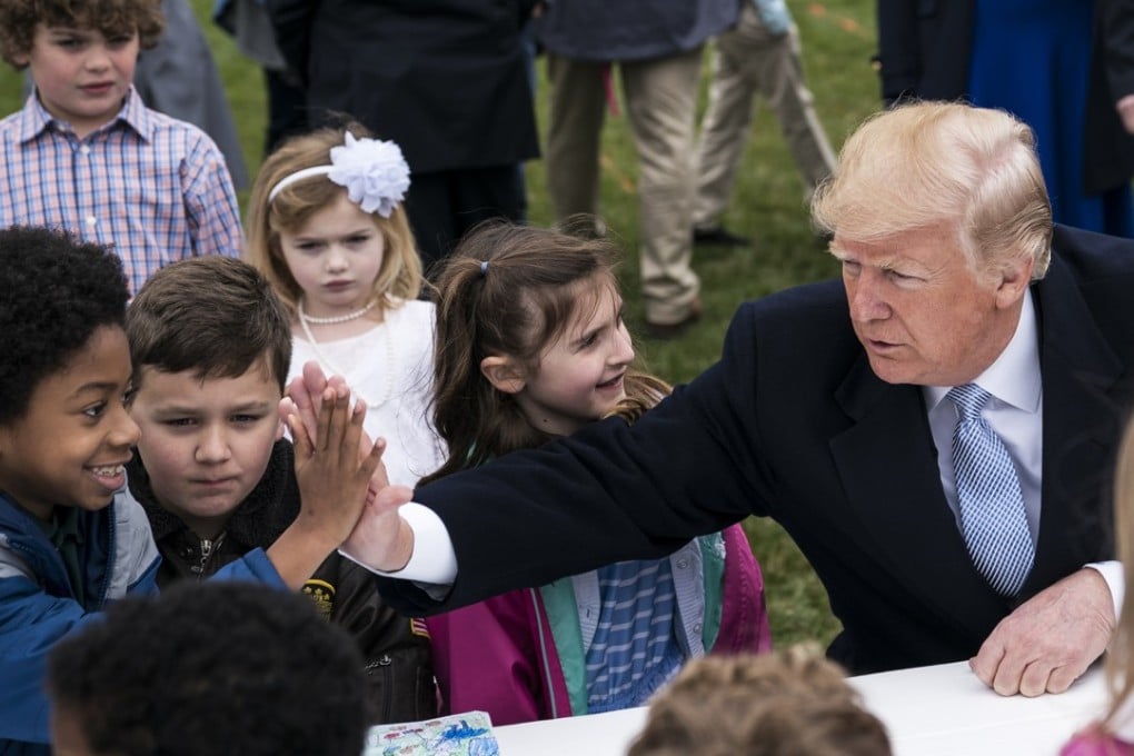 President Donald Trump greets children at the White House on April 2. Speculation is rife about Trump’s mental fitness for office. Photo: Washington Post