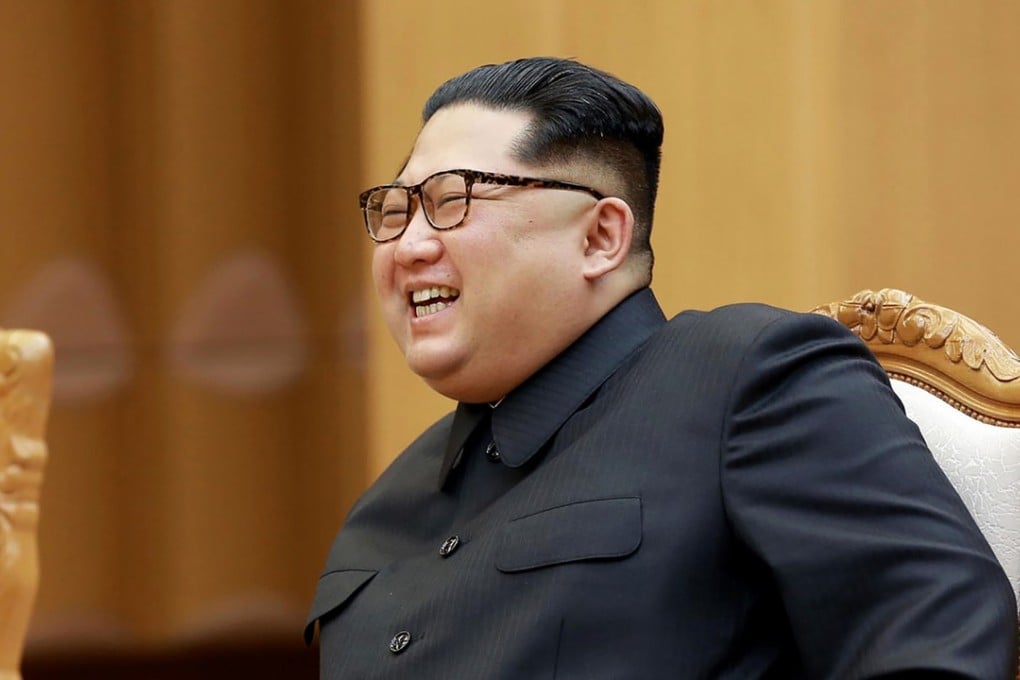 North Korean leader Kim Jong-un (seen on Thursday) has ordered his country to put its clock forward by half an hour to match the South, in what he says is the first practical step towards reunification. Photo: AFP PHOTO/KCNA via KNS
