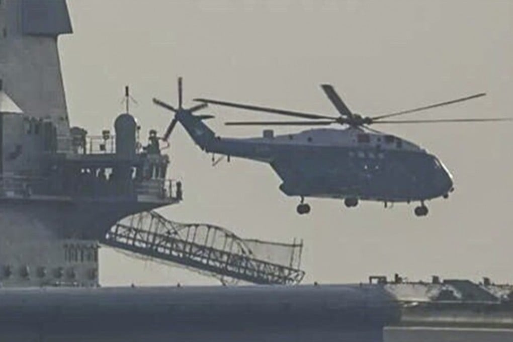 The transport helicopter took off from the warship in Dalian, then landed five minutes later. Photo: Weibo