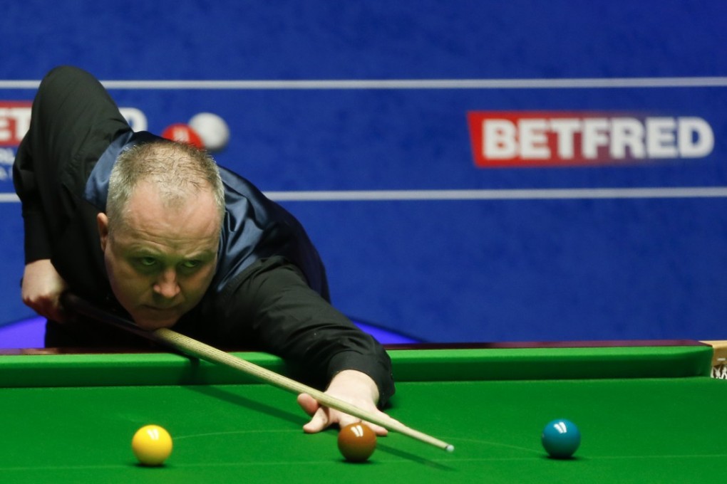 John Higgins of Scotland competes during the semi-final match against Kyren Wilson of England at the World Snooker Championship 2018 at the Crucible Theatre in Sheffield. Photo: Xinhua