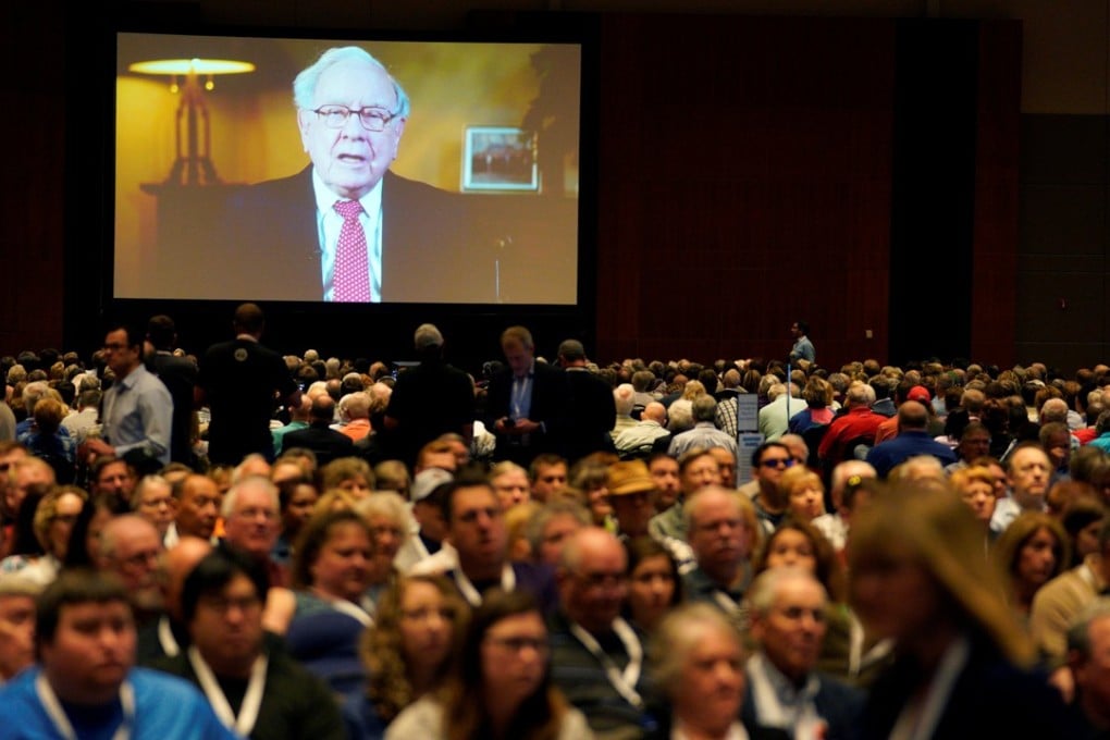 Warren Buffett, CEO of Berkshire Hathaway Inc is seen on a screen at the company's annual meeting in Omaha, Nebraska, Photo: Reuters
