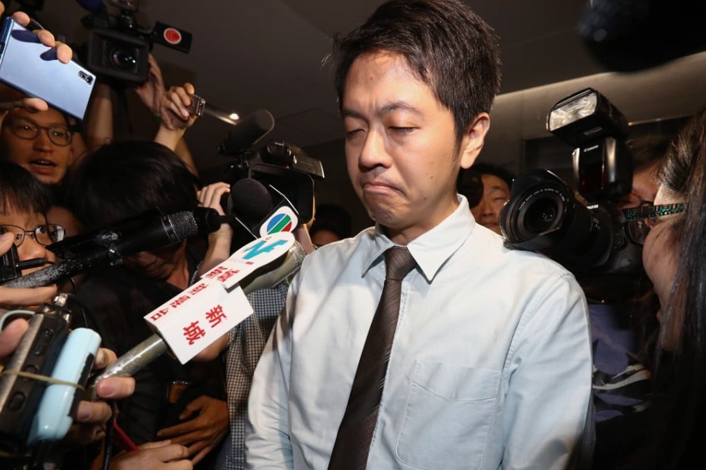 Ted Hui came under fire for snatching a phone from a female official. Photo: Nora Tam