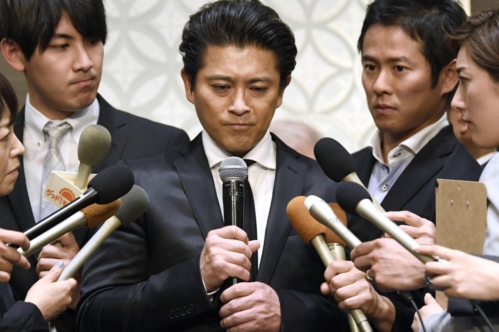 Tatsuya Yamaguchi, from the boy band Tokio, tells a press conference that he is facing a criminal investigation related to an allegedly indecent act with a teenage girl, and he quit the band. Photo: AP