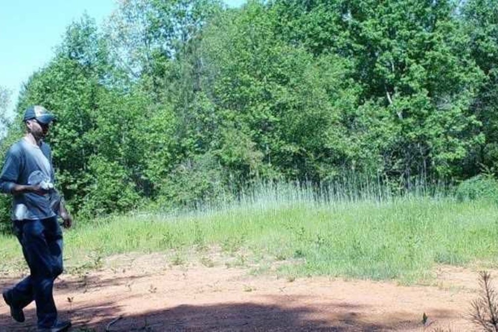 Rex Whitmire Harbour is seen in a trail camera photo on Friday May 4, 2018, prior to his firing on passing motorists outside Atlanta, Georgia. Photo: Hall County Sheriff’s Office