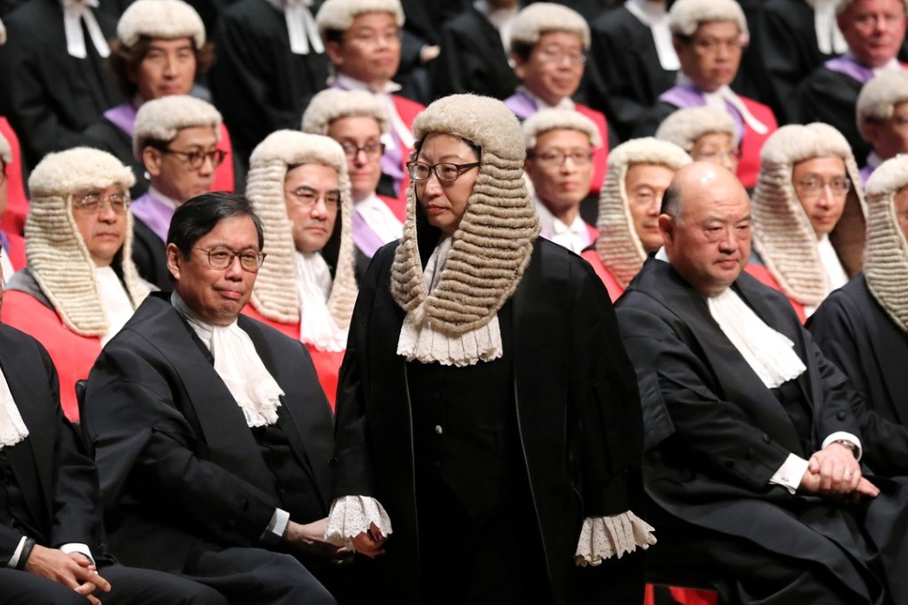 (centre) Secretary for Justice Teresa Cheng Yeuk-wah stands to give her address at the Ceremonial Opening of Legal Year 2018 in City Hall. 08JAN18 SCMP / Sam Tsang