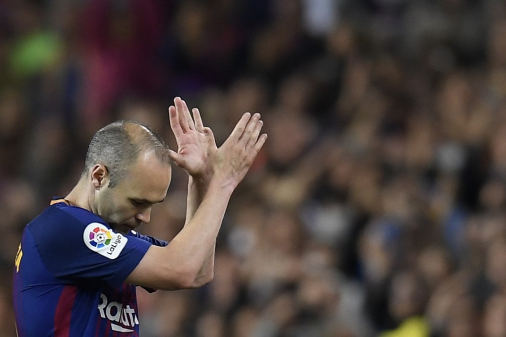 Barcelona’s Spanish midfielder Andres Iniesta acknowledges fans as he is substituted during his final El Clasico against Real Madrid. Photo: AFP