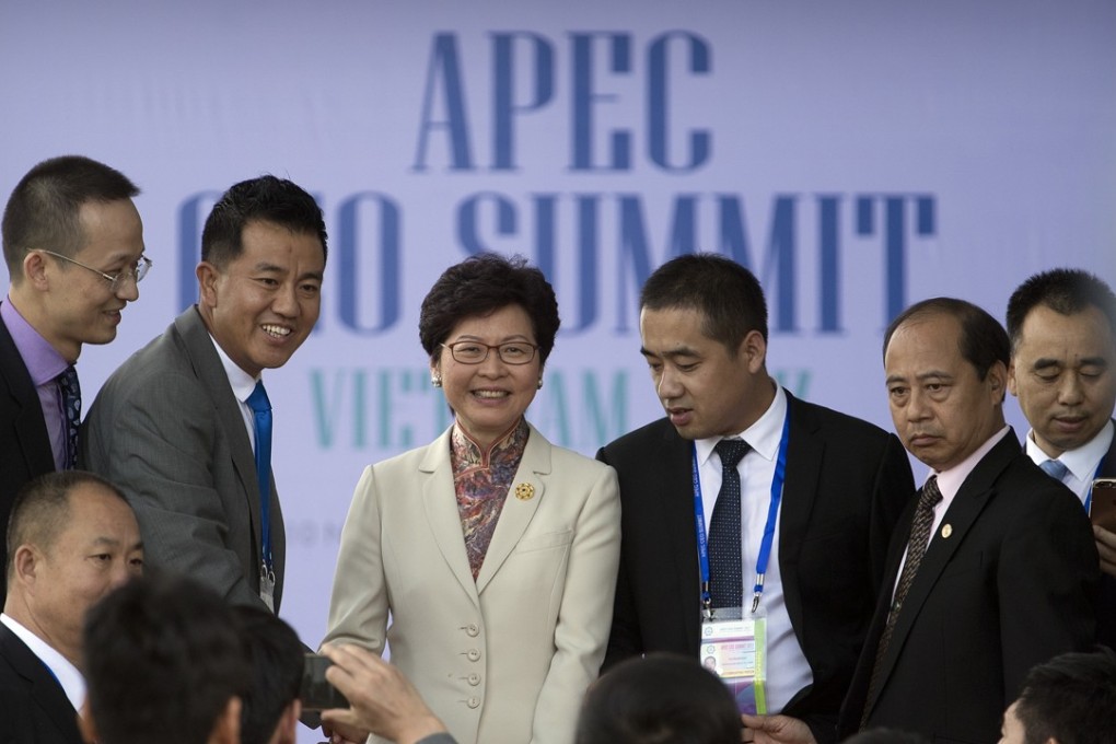 Hong Kong Chief Executive Carrie Lam Cheng Yuet-ngor, centre, leaves the Asia-Pacific Economic Cooperation CEO Summit in Danang, Vietnam, on November 9, 2017. Coordination between the governments of the Asia-Pacific region is essential for the formation of sustainable development policies. Photo: AP