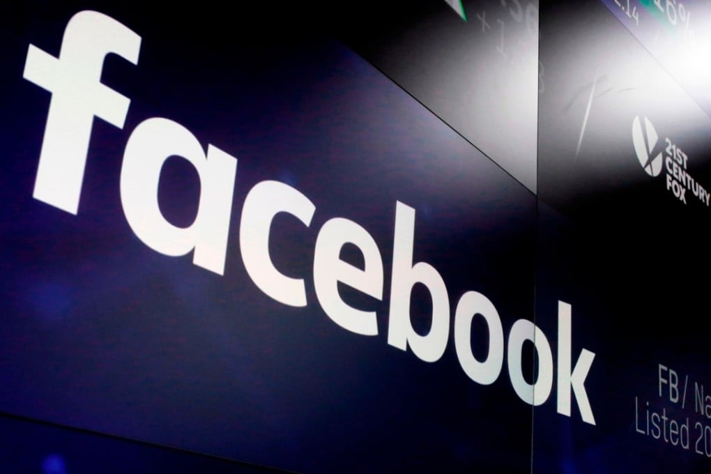 Facebook appears on screens at the Nasdaq MarketSite in New York's Times Square. Photo: AP