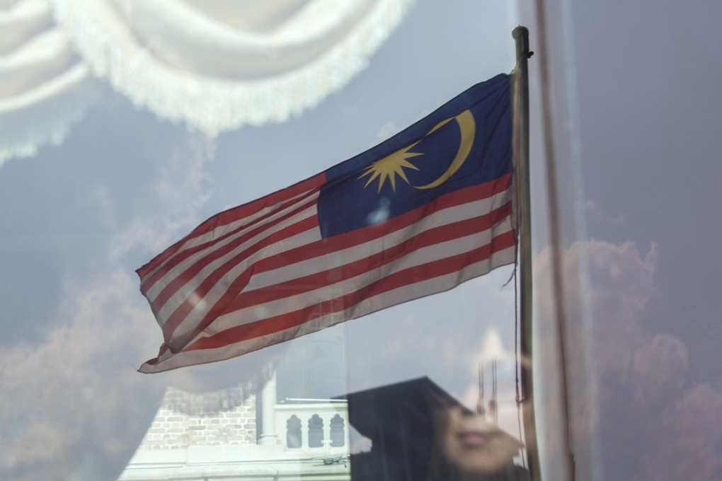 Polls show a tight contest between Malaysia Prime Minister Najib Razak's Barisan Nasional and his main challenger Mahathir Mohamad's four-party coalition. Photo: Bloomberg