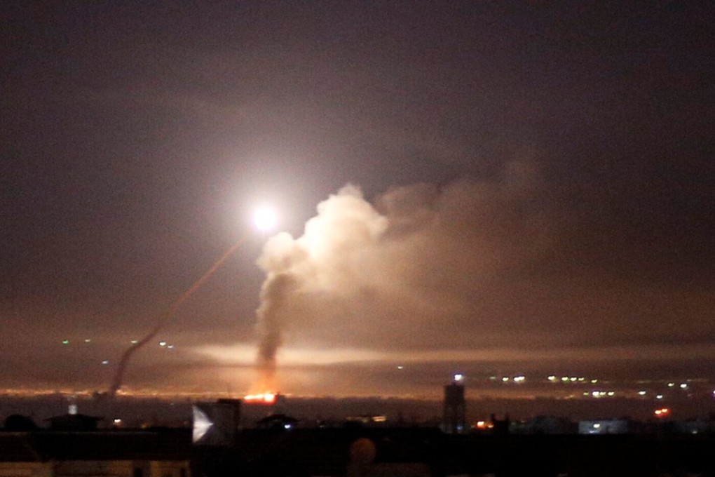 Missile fire is seen from Damascus, Syria, early on Thursday. Israel said it struck dozens of Iranian targets in Syria in response to overnight rocket attacks on its forces in the Golan Heights. Photo: Reuters
