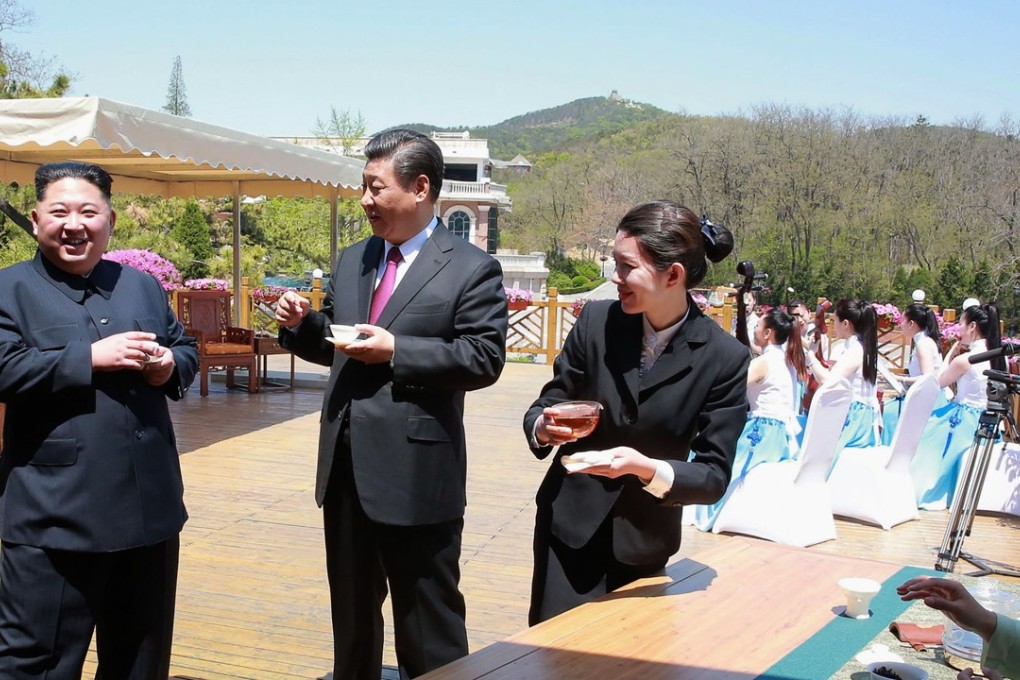 An official North Korean picture shows Kim Jong-un and Xi Jinping having tea in the Chinese city of Dalian earlier this week. Photo: AFP/ KCNA VIA KNS