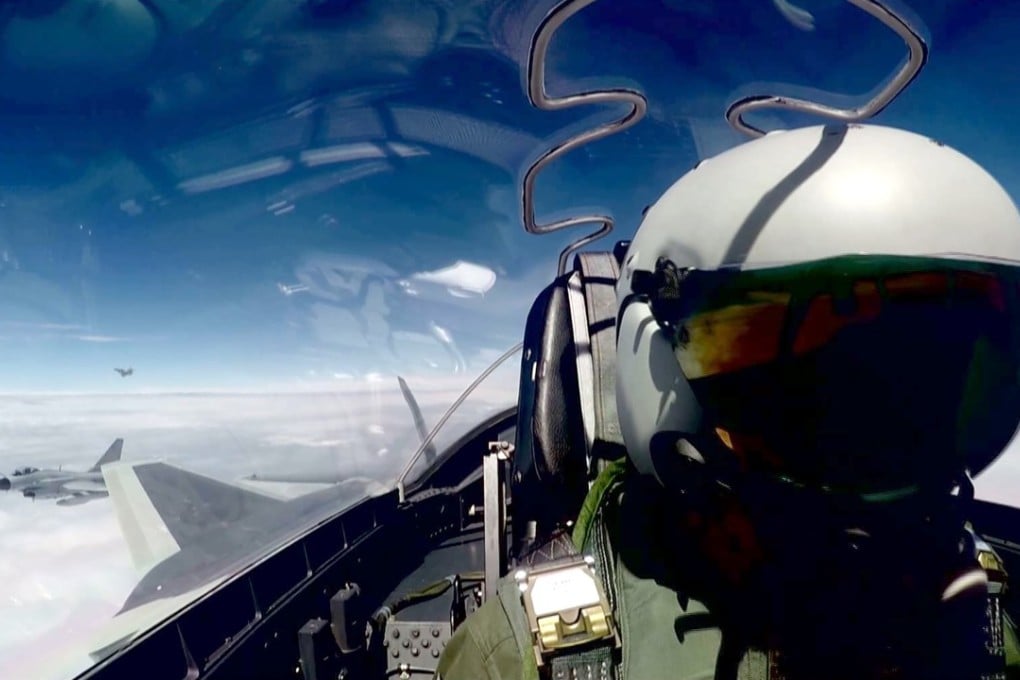 China’s J-20 stealth fighters are seen taking part in a drill over the sea in this undated photo released by the air force. Photo: Xinhua