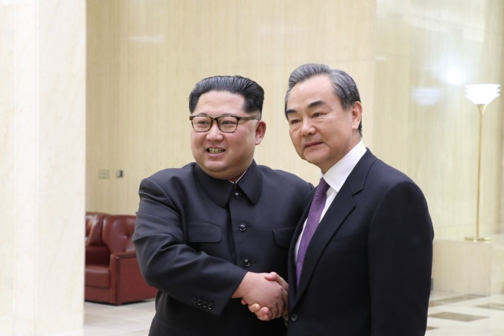 North Korean leader Kim Jong-un shakes hands with Chinese foreign minister Wang Yi in Pyongyang on May 3. Photo: Xinhua