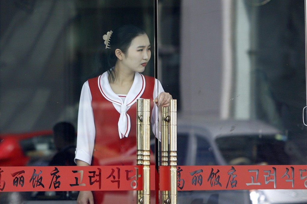 File photo of a North Korean waitress at a restaurant in Dandong – not one of the women who defected. Photo: AFP