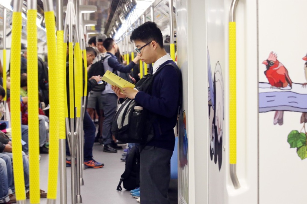 Commuters on the MTR South Island Line in January 2017. Hong Kong’s public transport system is a good example of the sharing economy at work. Photo: David Wong
