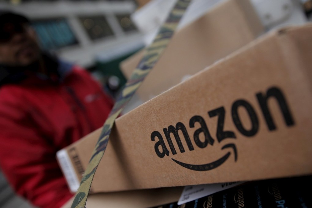 Amazon boxes are seen stacked for delivery in the Manhattan borough of New York City, January 29, 2016. Photo: Reuters