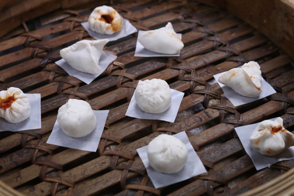 Making char siu bao can be tricky. Here are some perfect bao in the middle of the steamer, surrounded by messy ones made by reporter Bernice Chan. Photo: Winson Wong
