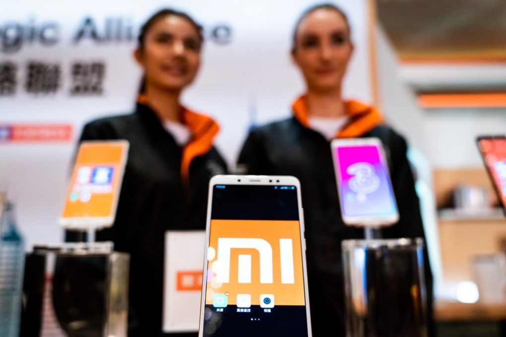 Xiaomi smartphones stand on display during a news conference in Hong Kong on May 3, 2018. The Chinese technology start-up is seeking to invalidate certain patent rights that it allegedly infringed in a lawsuit filed by a unit of rival smartphone maker Coolpad Group. Photo: Bloomberg
