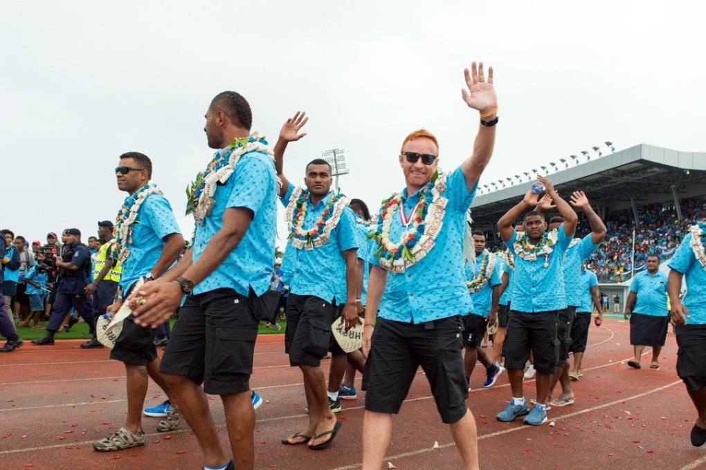 Ben Ryan with the Olympic champions in Suva. Photo: AFP