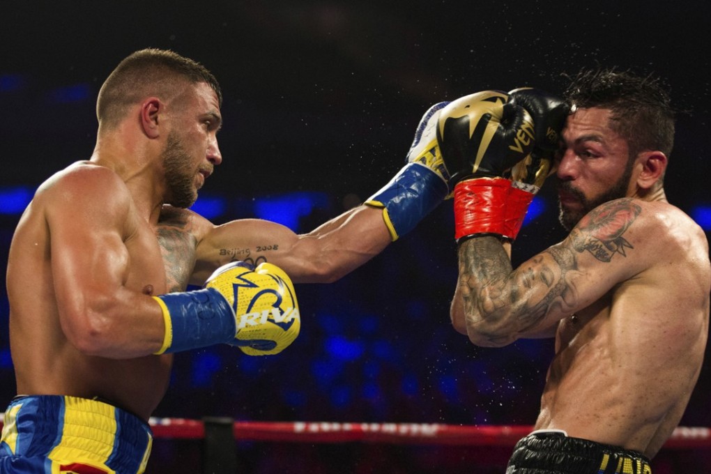 Vasiliy Lomachenko claimed the lightweight title with a win over Jorge Linares in New York. Photo: AP