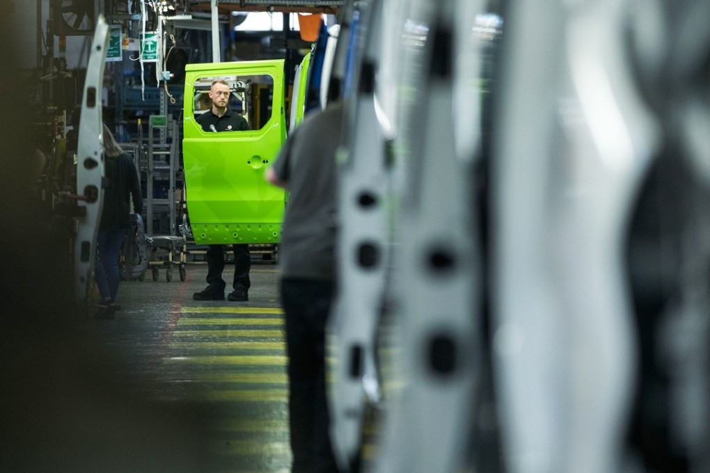 An employee works on the final assembly line at the Vauxhall plant in Luton, Britain, in April. The UK automotive industry, once the joke of British manufacturing, is now one of the jewels in Britain’s industrial crown, employing nearly one million workers. Brexit could change this overnight. Photo: Bloomberg