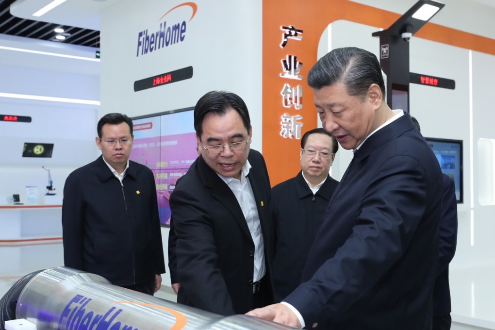 President Xi Jinping (right), visiting a technology firm in Wuhan last month. He has told state agencies to back Hong Kong’s push to be an international innovation hub. Photo: Xinhua