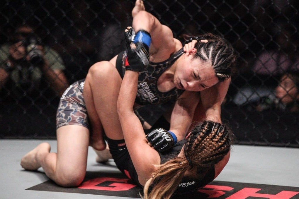 Angela Lee is pinned to the ground by Mei “V.V” Yamaguchi during their last fight in 2017. Photos: Singaporemaven/One Championship