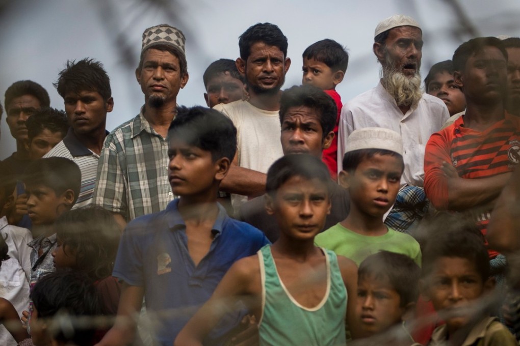 Rohingya refugees near the border with Bangladesh. The crisis has displaced around 700,000 people. Photo: AFP