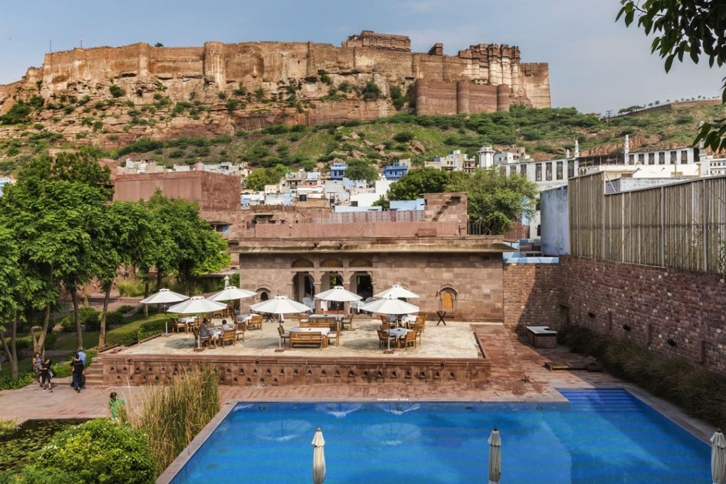 The Raas hotel in Jodhpur, India’s ‘Blue City’, with the imposing clifftop Mehrangarh Fort in the background.