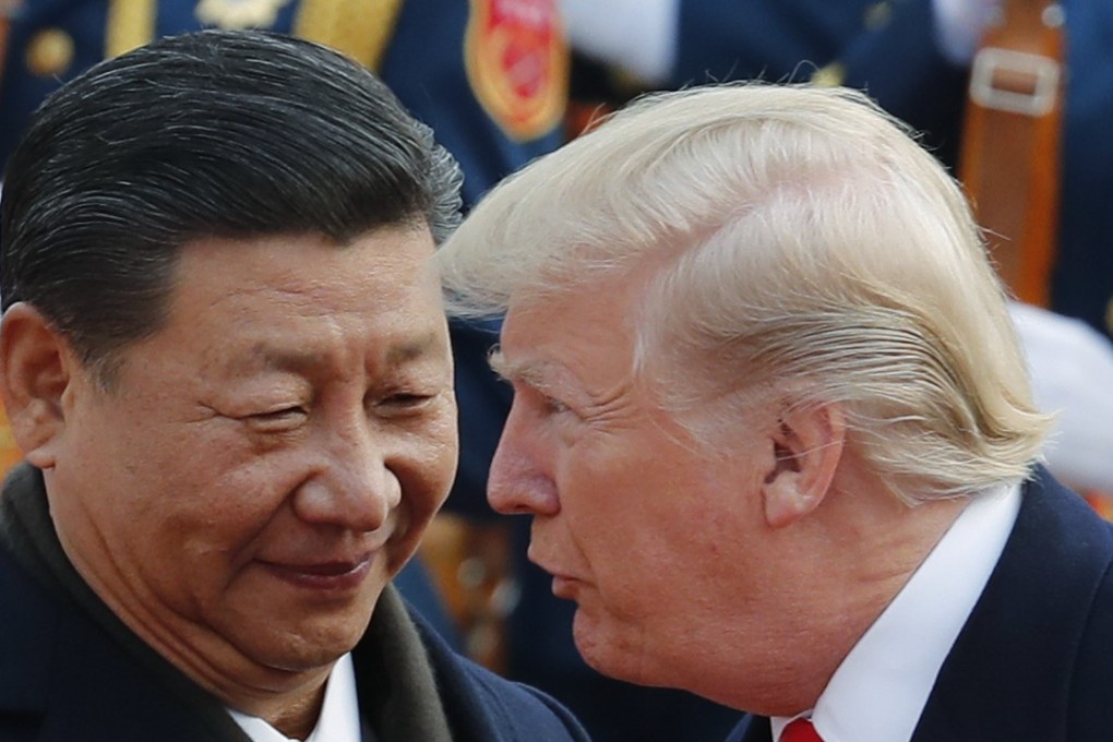 In this November 9, 2017 photo, US President Donald Trump (right) talks to Chinese President Xi Jinping during a welcome ceremony at the Great Hall of the People in Beijing. The brewing China-US trade conflict features two leaders who've expressed friendship but are equally determined to pursue their nation's interests and their own political agendas. Photo: AP