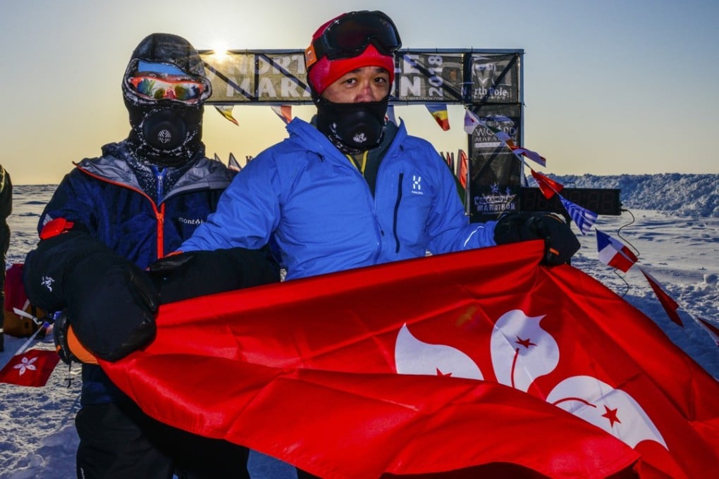 Blind runner Gary Leung (left) and Andy Chik after completing the North Pole Marathon.