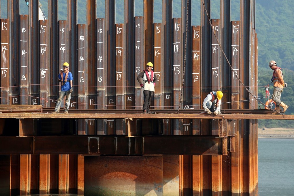 The worksite of the Hong Kong-Zhuhai-Macau Bridge off Chek Lap Kok Airport. Hourly construction labour costs in Hong Kong leapt 25 per cent in 2017, according to global project manager, Turner and Townsend. Photo: K. Y. Cheng