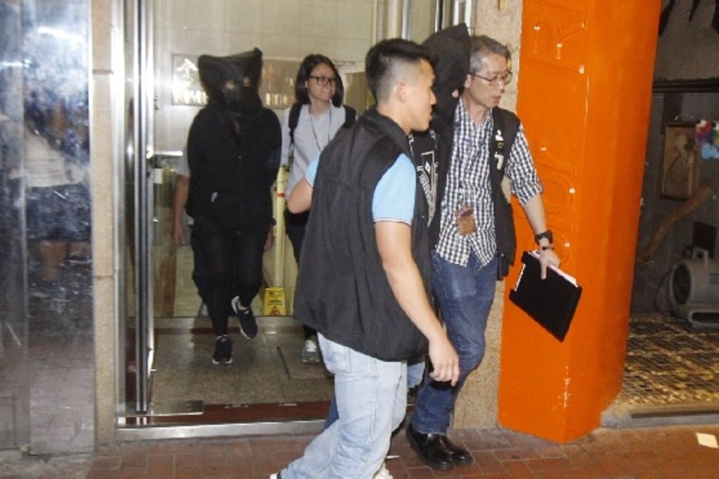 In a separate raid on the same day, a man and a woman were arrested on suspicion of being the masterminds of another vice syndicate. Photo: Handout